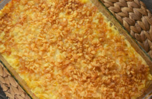 Potato Casserole with Rice Krispies is a cheesy hash brown casserole with a crispy, crunchy topping.  Often called Funeral Potatoes, this is the perfect side dish for almost any entrée. 