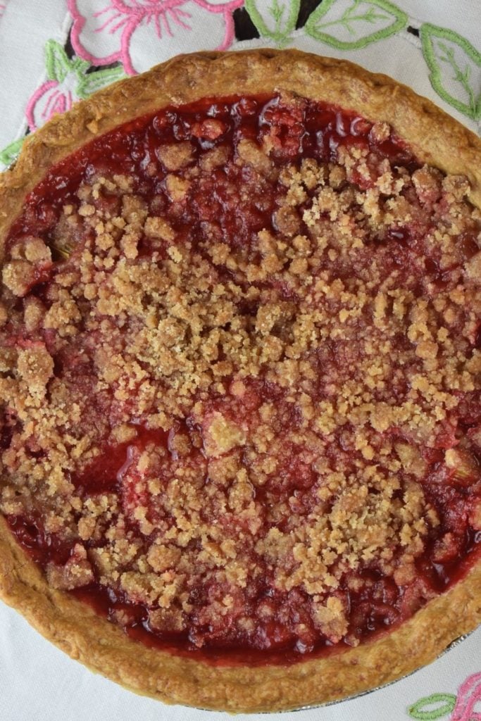 Rhubarb Pie with Strawberry Jello is an easy spring pie recipe.  The classic flavors of strawberry and rhubarb come together in this tasty pie with a special crumble topping.   