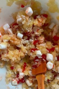 Glorified Rice is an old fashioned dessert salad consisting of white rice, mini marshmallows, pineapple, maraschino cherries and Cool Whip. Served cold, this vintage recipe is perfect for summer.
