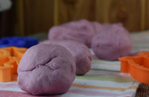 Summer or winter, this Kool-Aid Play Dough is the perfect activity for kids.  Using Kool Aid results in an edible playdough recipe that has a fun smell and vibrant color.