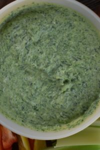 Dip your favorite vegetables, like celery, in this delicious frozen spinach dip.