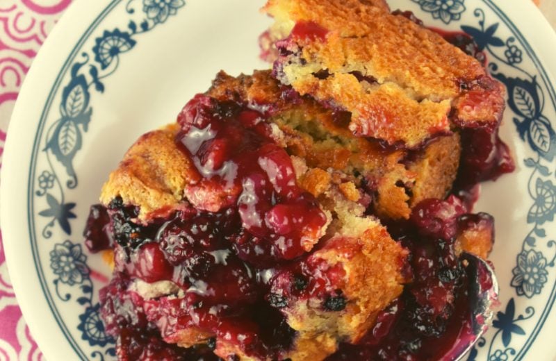 My Dad gives this Old Fashioned Blackberry Cobbler two thumbs up!  Follow these easy instructions on how to make a blackberry cobbler from scratch using fresh blackberries.  This simple recipe is a home run each and every time.