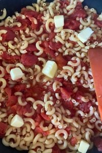 Old Fashioned Macaroni and Tomatoes takes you back to your childhood.  With a just a few simple ingredients such as canned tomatoes, elbow macaroni, sugar, salt and butter, you can recreate Grandma's Macaroni with Tomatoes Recipe.