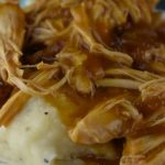 Crock Pot Chicken and Brown Gravy is a simple slow cooker dinner with only three ingredients.  The combination of condensed French Onion Soup and Golden Mushroom Soup make a tasty chicken and brown gravy served over mashed potatoes.
