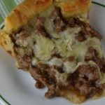 French Onion Hamburger Pie is a quick, thirty minute dinner.   This ground beef crescent pie recipe will satisfy the hungriest of appetites. 
