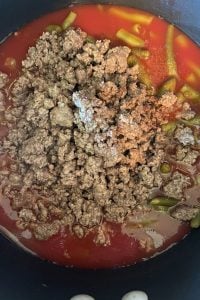 Tasty Green Beans is a unique green bean recipe with only five ingredients including canned green beans and ground beef.  You can easily dress up green beans with this simple green bean dish.