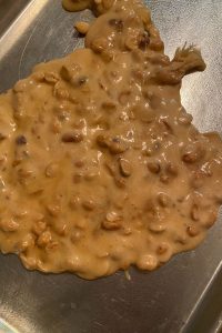 10 Minute Microwave Peanut Brittle is the best because it's quick, easy, crunchy and delicious.  This Peanut Brittle recipe has Karo syrup and baking soda.