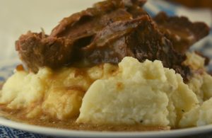 This Crock Pot Beef Roast and Gravy isn't just a Sunday Roast Beef and Gravy recipe; eat it any day of the week.  It's a moist slow cooker roast beef recipe that tastes great served over mashed potatoes.