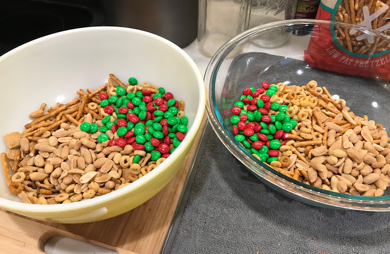 We separate our dry ingredients into 2 bowls to make it easier to coat with the melted almond bark.