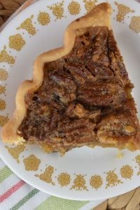 Old Fashioned Pecan Pie is a classic pecan pie recipe with dark corn syrup (Karo).