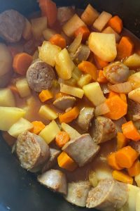 Slow Cooker Bratwurst Casserole is a tasty brat stew recipe with potatoes, carrots, celery, onions and brats stewed in a tasty tomato sauce. This is a great way to use raw, uncooked brats other than on the grill.
