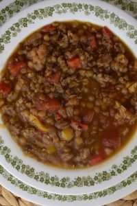 Crock Pot Lentil Soup with Sausage is a hearty lentil soup with tomatoes and sausage. 