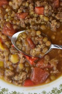 Crock Pot Lentil Soup with Sausage is a hearty lentil soup with tomatoes and sausage. 