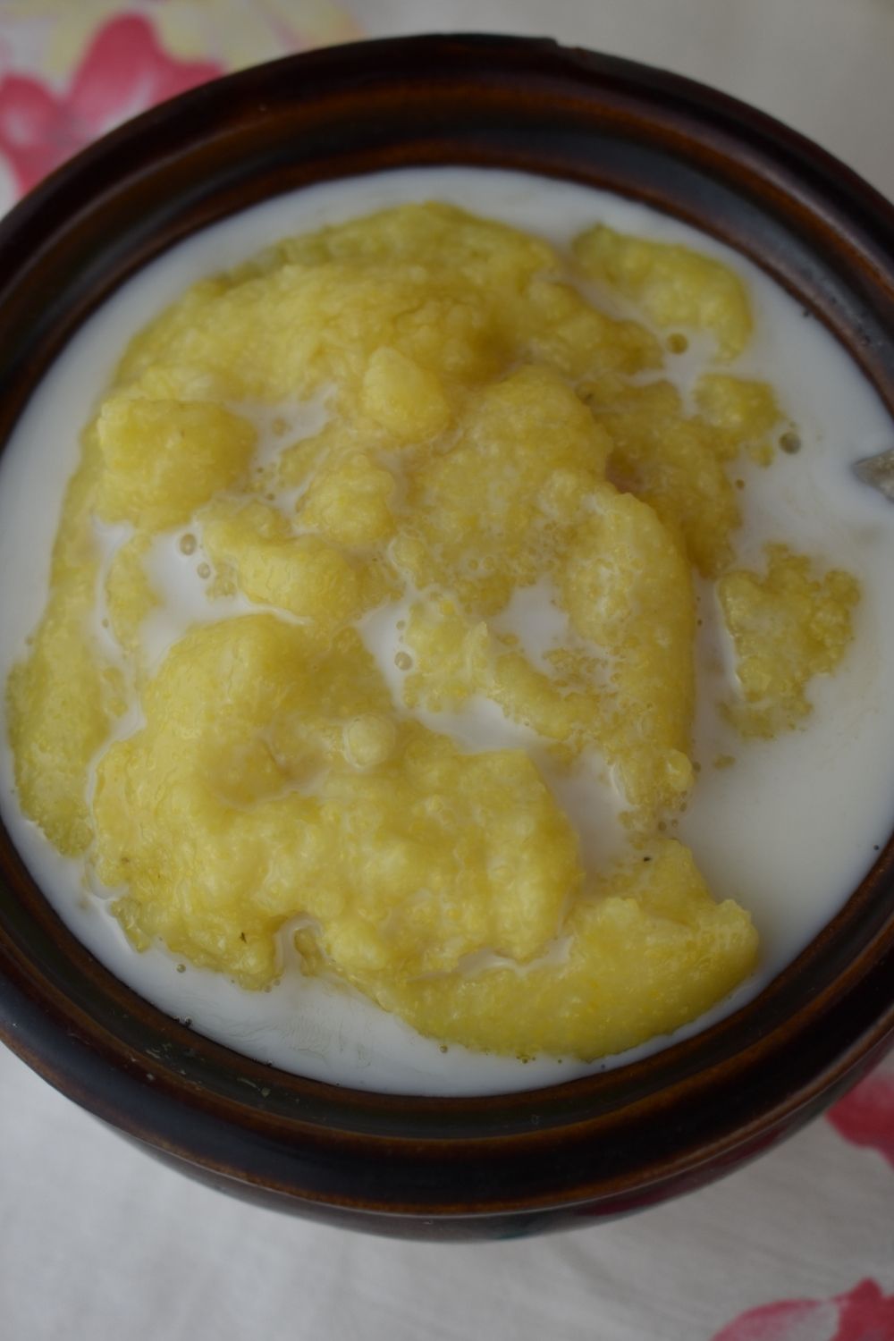While many recipes call for fried cornmeal mush, this particular Cornmeal Mush Recipe is not fried.  Instead, this old fashioned mush recipe is topped with sugar and milk and eaten with a spoon. 