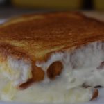 Craving an extra cheesy hot ham and cheese sandwich? Try this Easy Croque Monsieur or Madame recipe for a shortcut to the classic sandwich found at French bistros.  Follow these simple instructions for how to make a Croque Monsieur, or add an egg on top for a Croque Madame. 