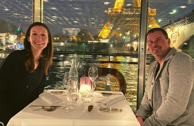 An evening cruise down the Seine River is a perfect way to dine while seeing the Eiffel Tower lit up.