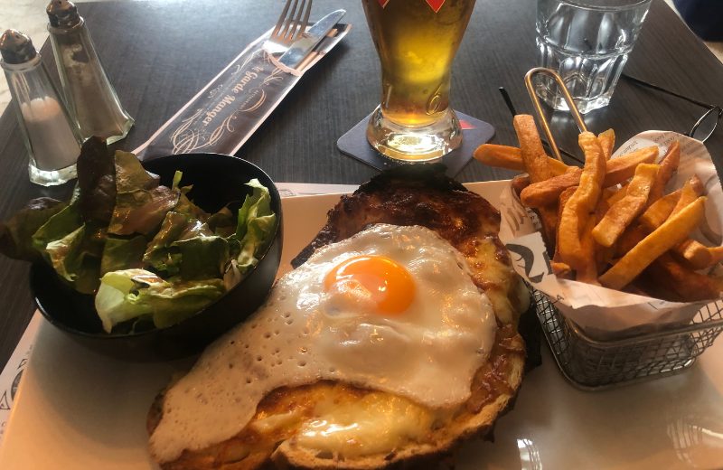 Croque Monsieur is a classic French hot ham and cheese sandwich on menus everywhere. The lady version is called a Croque Madame and it has a runny egg served over top.