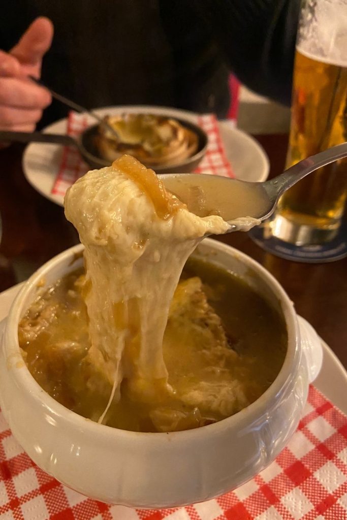French Onion Soup or soupe à l'oignon is a famous part of French cuisine. There is just something amazing about a bowl on oniony, beefy broth with a melty French cheese and chunks of baguette.
