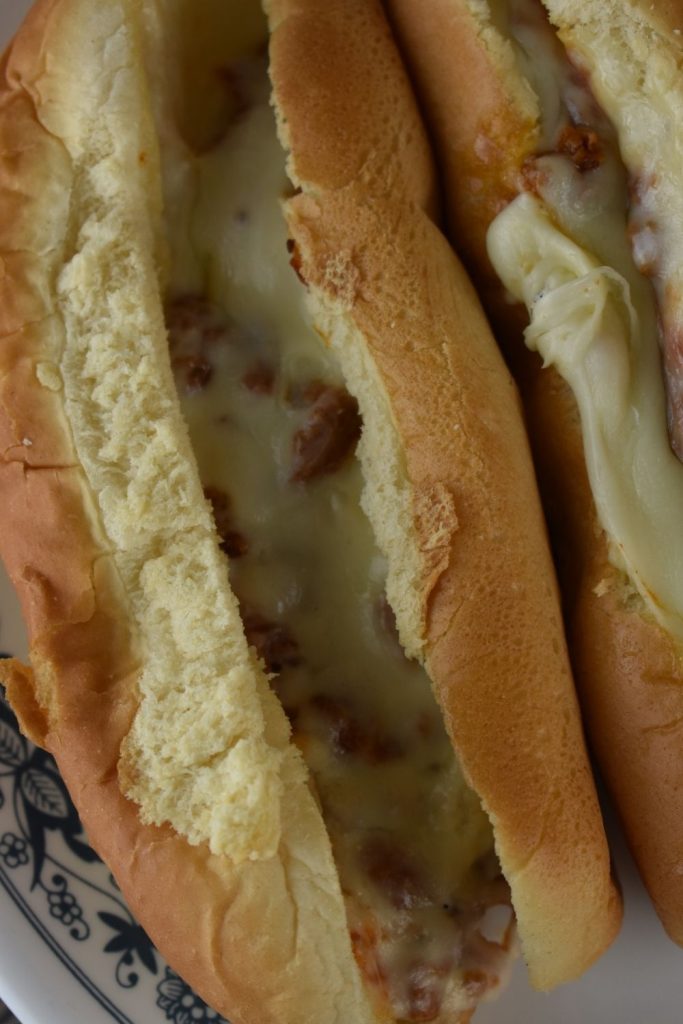 Our Ground Beef Stromboli Sandwich Recipe creates cheesy, beefy and perfect meal. This Stromboli recipe starts with a hamburger sauce, and we serve it on a hoagie.