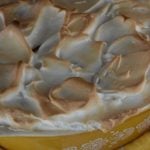 Old Fashioned Banana Pudding is a from scratch vanilla pudding layered with vanilla wafers and bananas and topped with a beautiful meringue.  Baked Banana Pudding with Meringue could also be made with instant pudding for a shortcut recipe.