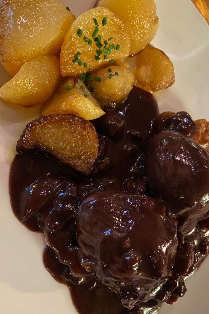 My favorite meal in Burgundy (and possibly all of France) was poached eggs in red wine sauce. The flavor of the sauce was out of this world; plus I'm a big fan of a runny, poached egg.