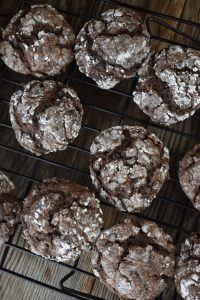 Chocolate Cake Mix Crinkle Cookies is a recipe that uses chocolate cake mix and cream cheese.  This shortcut recipe is a cross between a classic crinkle cookie and a gooey butter cake.