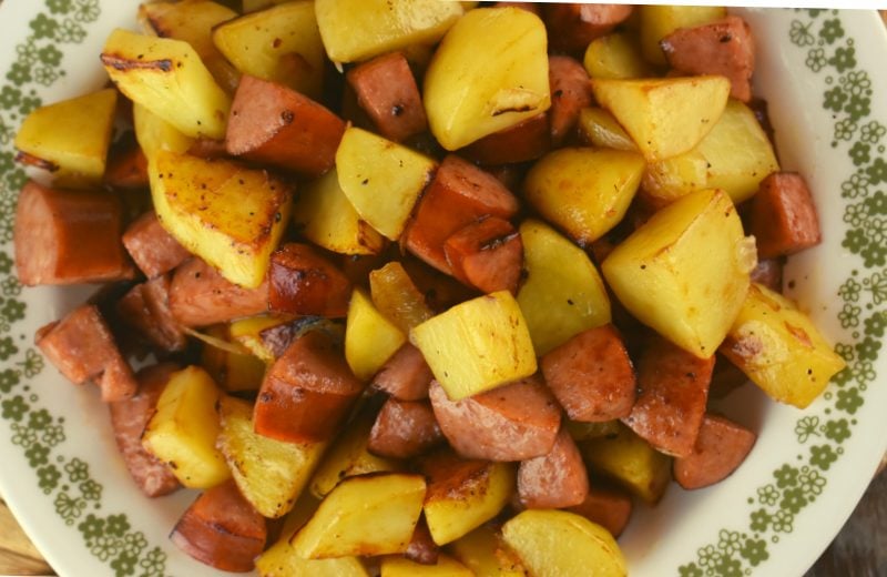 Fried potatoes with smoked sausage and onions is a delicious meal that you can whip up in no time. This tasty dish could be served as breakfast, lunch or dinner.