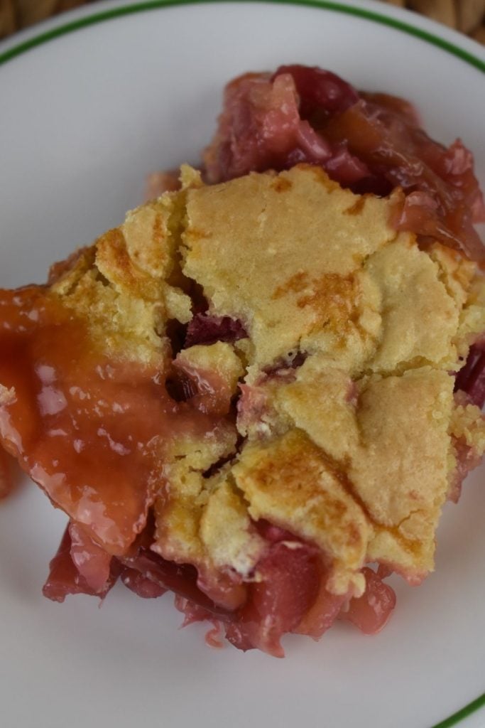 Old Fashioned Rhubarb Pie (no crust) has a simple batter over top that includes lemon extract. Plus, fresh lemon juice is squeezed right over top the pie before baking. The acidic lemon balances all of the sugar in this crust-less rhubarb pie.