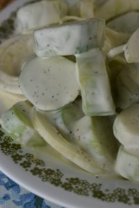 Old Fashioned Creamy Cucumber Salad is a simple summer salad featuring crisp cucumbers and sliced onions.  This creamy cucumbers recipe has mayo but no vinegar.