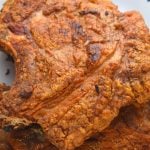 Fried Pork Chops is a old fashioned recipe using just flour; there's no egg or breadcrumbs needed.  Follow these easy instructions for how to make fried pork chops like grandma used to make.
