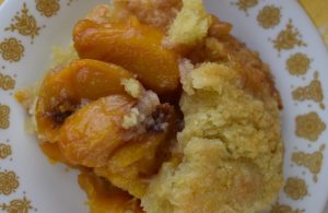 Old Fashioned Peach Crumble is a perfectly sweet peach bottom topped with a golden brown crumble topping. This fresh peach crisp recipe without oats has only six simple ingredients and is easy to make. 