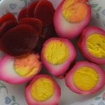 Pickled Eggs in Beet Juice is the ultimate old fashioned recipe.  The combination of hard boiled eggs and beets will take you back to your Southern roots. Follow these easy instructions for how to make pickled beets and eggs. 