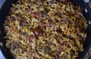 Easy Sausage Casserole with Egg Noodles is the perfect week night dinner.  With ground pork sausage, wide egg noodles and just a handful of other staples, you'll have chili sausage supper on the table in no time at all.