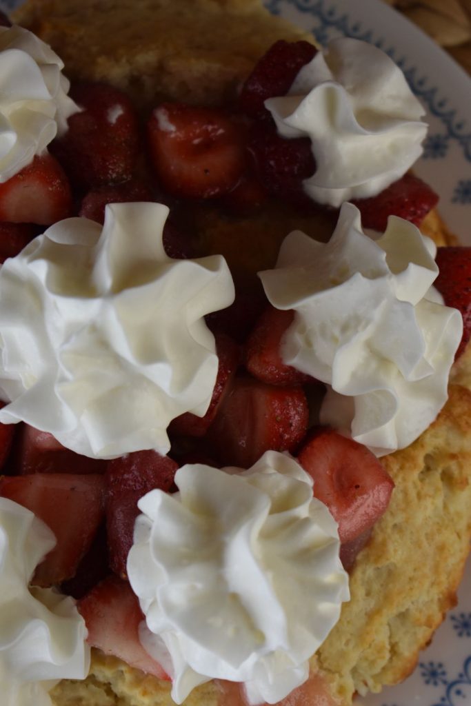 Whipped cream makes this strawberry dessert so much better.