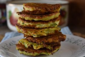 Zucchini Patties with Bisquick uses shredded zucchini, eggs, and Parmesan cheese .  Follow this recipe for egg zucchini fritters for a quick side dish with a crispy edge that everyone loves.