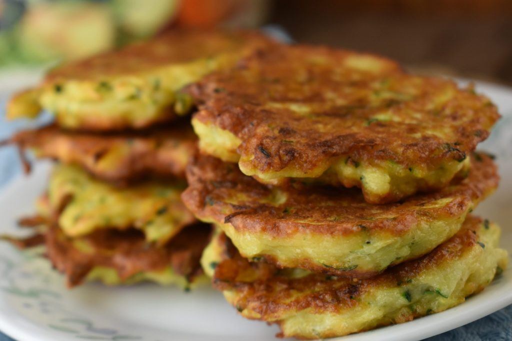 Zucchini Patties with Bisquick uses shredded zucchini, eggs and Parmesan cheese to make a delicious side dish.