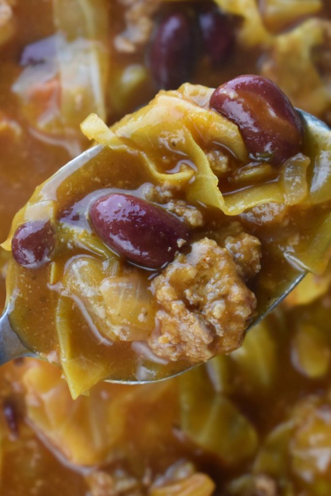 Cabbage and Ground Beef Soup is an old fashioned staple in many households. This easy cabbage soup has hamburger, kidney beans and canned tomato basil soup for an extra yummy flavor. Serve this up on a cold day with crusty bread or simple crackers.