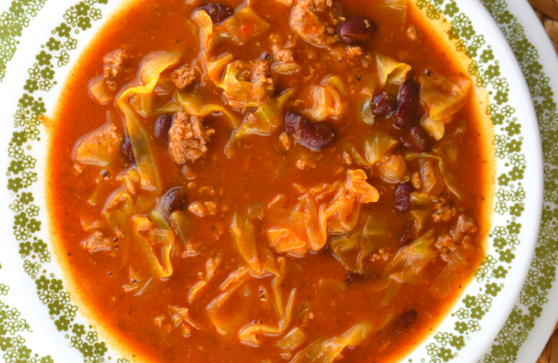 Cabbage and Ground Beef Soup is an old fashioned staple in many households. This easy cabbage soup has hamburger, kidney beans, and canned tomato basil soup of extra yummy flavor. 