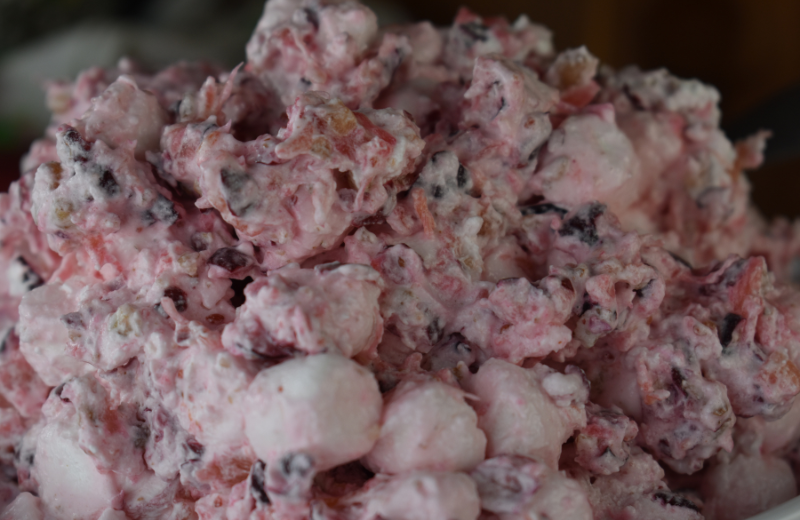 Cranberry Fluff is an old school cranberry salad with fresh cranberries and walnuts. This treat is the perfect holiday side dish to take you back to the good old days.