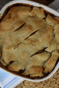 Old Fashioned Deep Dish Apple Pie recipe is an easy way to make apple pie.  This apple slab pie has no bottom crust, instead the apples are layered in a 9 x 9 inch baking dish with one crust layered over top.