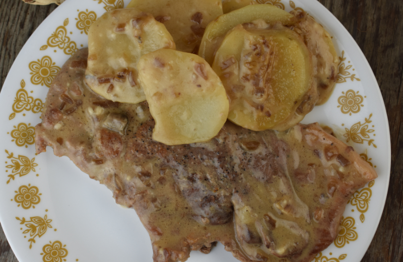 Pork Steak and Gravy makes a juicy pork steak using the oven. This smothered pork steak and potatoes is an easy pork steak recipe for any night of the week.