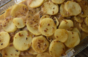 Pork Steak and Gravy makes a juicy pork steak using the oven.  This smothered pork steak and potatoes is an easy pork steak recipe for any night of the week. 