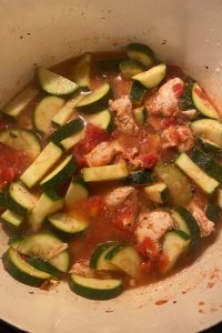 Chicken with Zucchini and Tomatoes is a simple meal full of flavor.  This healthy chicken and zucchini recipe makes a stewed chicken and vegetable dish that gets served over rice. 