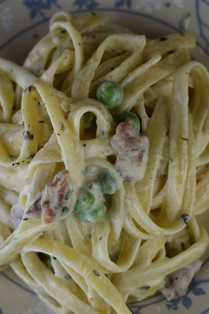 Hay and Straw Pasta is a fan favorite.  Cooked fettuccine with bacon and peas gets smothered in a cheesy Parmesan sauce.