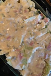 Ham and Cabbage Casserole is a great way to use up leftover holiday ham. Scalloped Cabbage and Ham is an old fashioned recipe that will become a go-to leftover ham recipe. My favorite part is the crunchy, cheesy topping made with shredded cheese and cornflakes. 