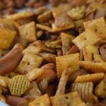Homemade Chex Mix is a classic holiday party favorite. This classic snack food is a great way to feed a hungry crowd. Try this Chex Mix recipe with bold and savory flavors this season.