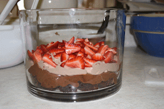 Top the first three layers with strawberries in easy double chocolate trifle.