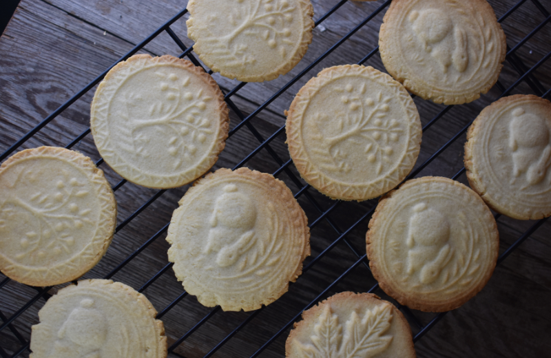 Stamped cookies are a shortbread batter that is embossed with pretty images like these with trees and rabbits.