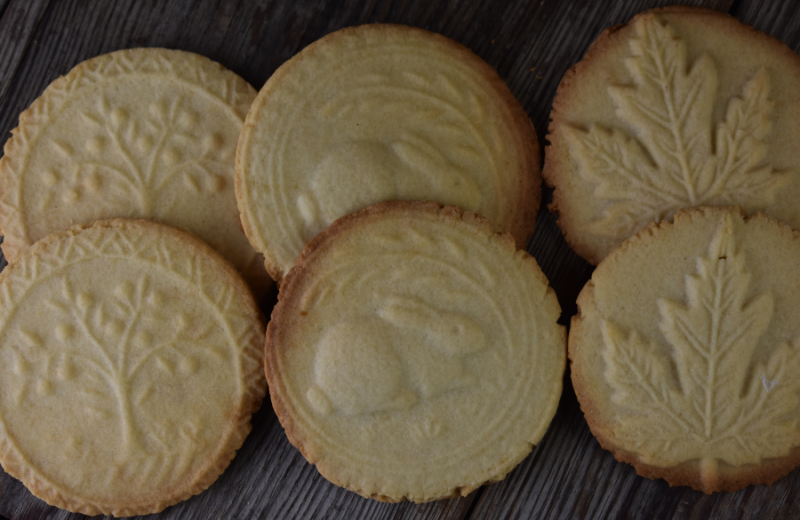 Stamped cookies are a shortbread batter that is embossed with pretty images like these with trees, rabbits and leaves.