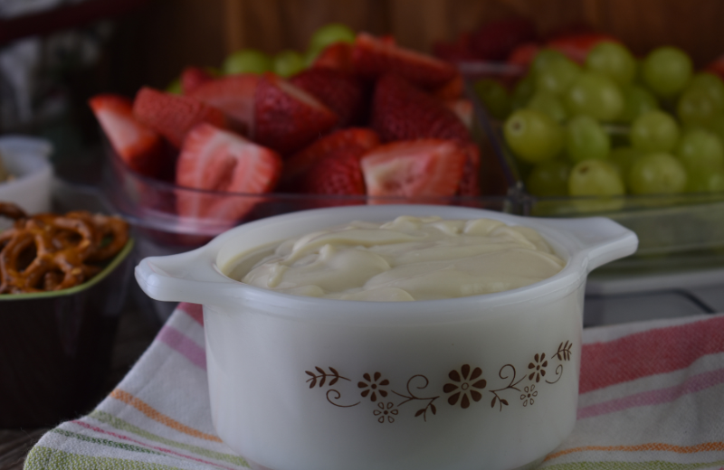 Make your own easy sour cream fruit dip with 2 ingredients. You only need sour cream and brown sugar to make this sweet and tangy dip. It's the perfect dip for any type of fruit, pretzels, graham crackers, and animal crackers.